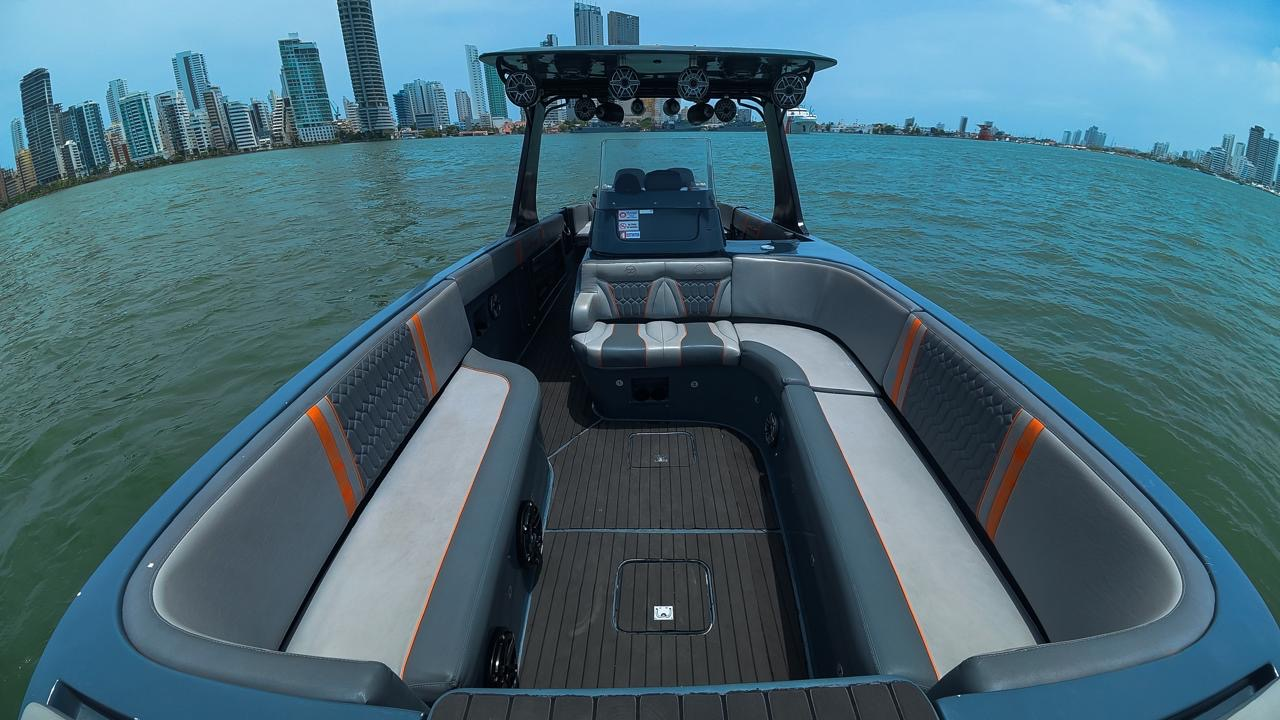 Open deck and lounge seating on the 38' luxury speedboat