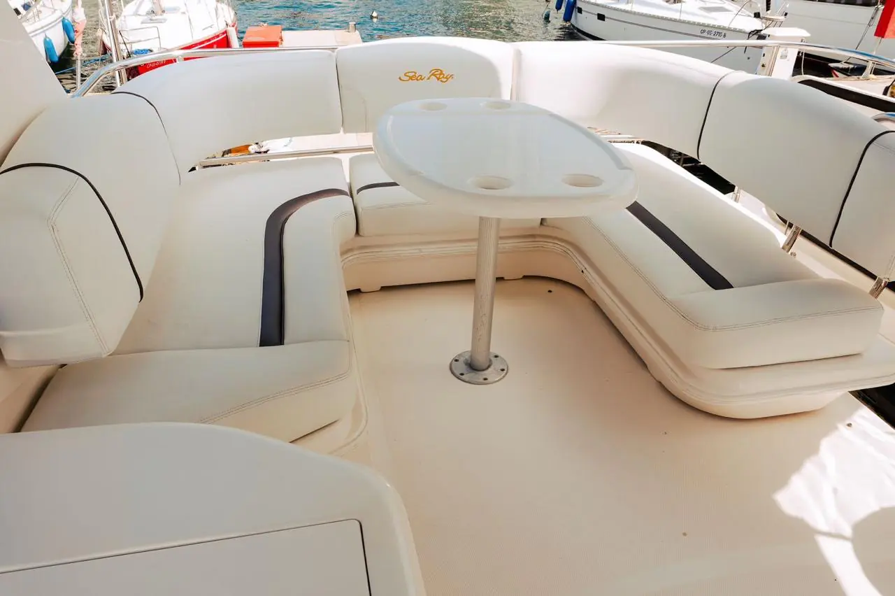 Cockpit seating and table on the 44 Sea Ray flybridge