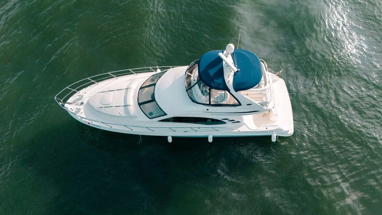 Aerial view of the 44 Sea Ray with blue bimini over the flybridge