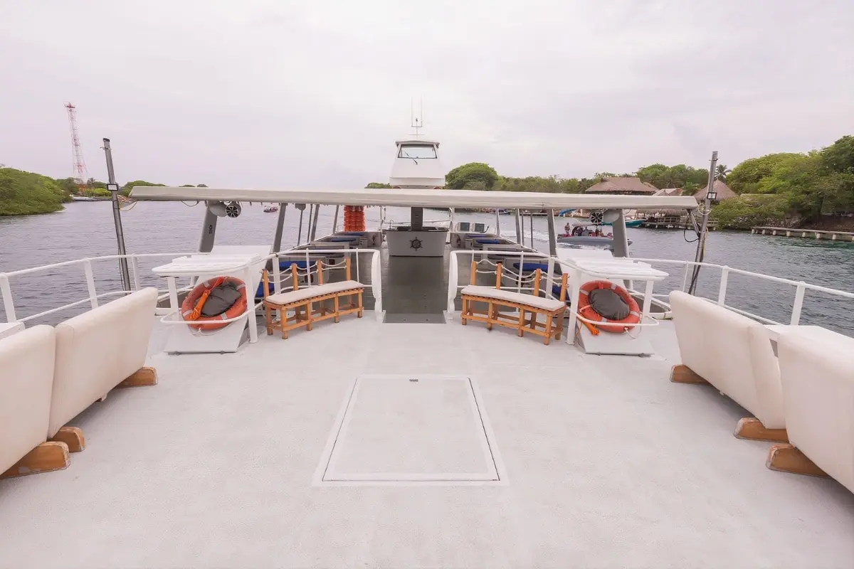 Open upper deck with seating on the 87 event catamaran