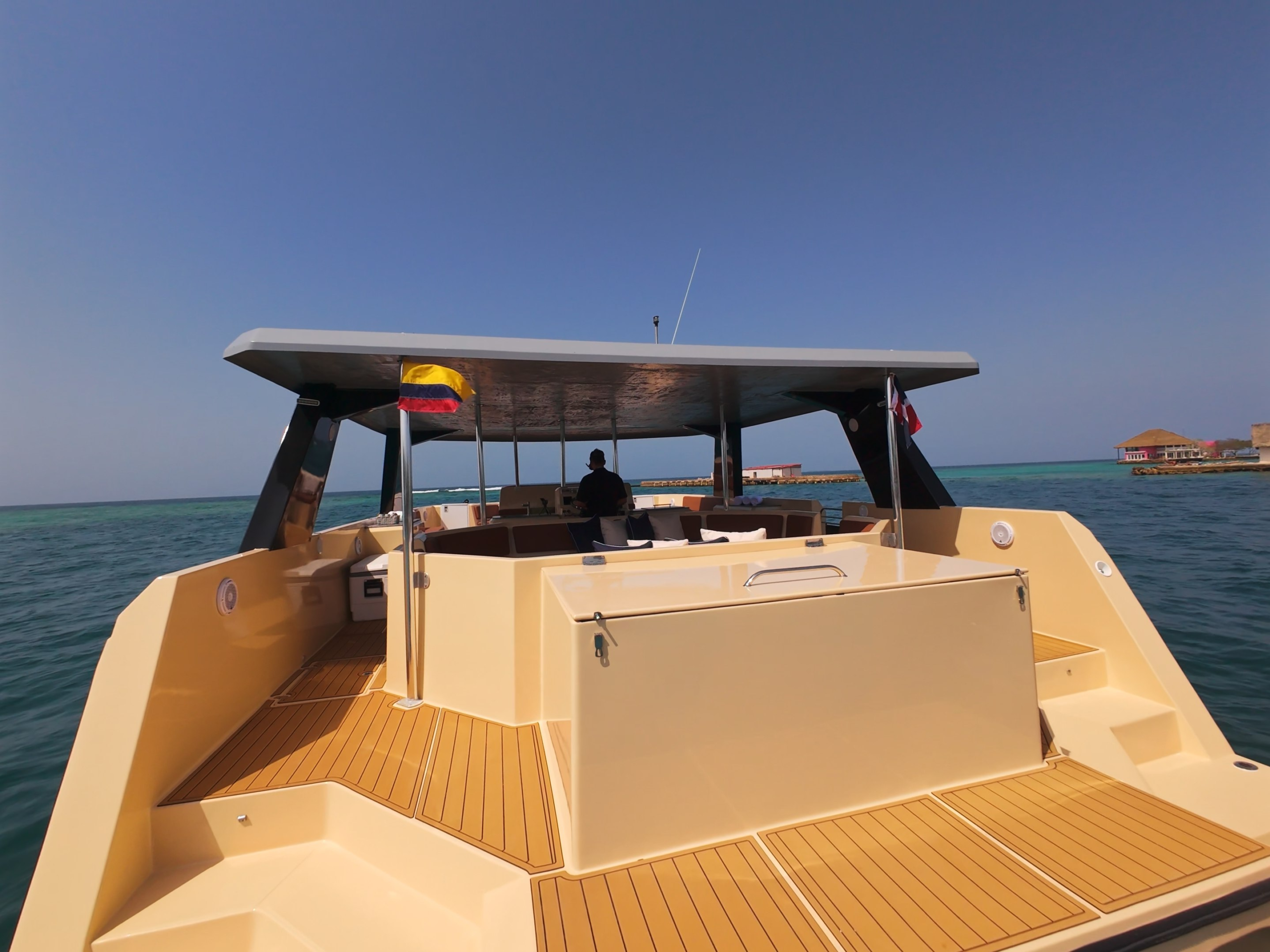 Aft deck with Colombian flag on the Alisio 45 powercat