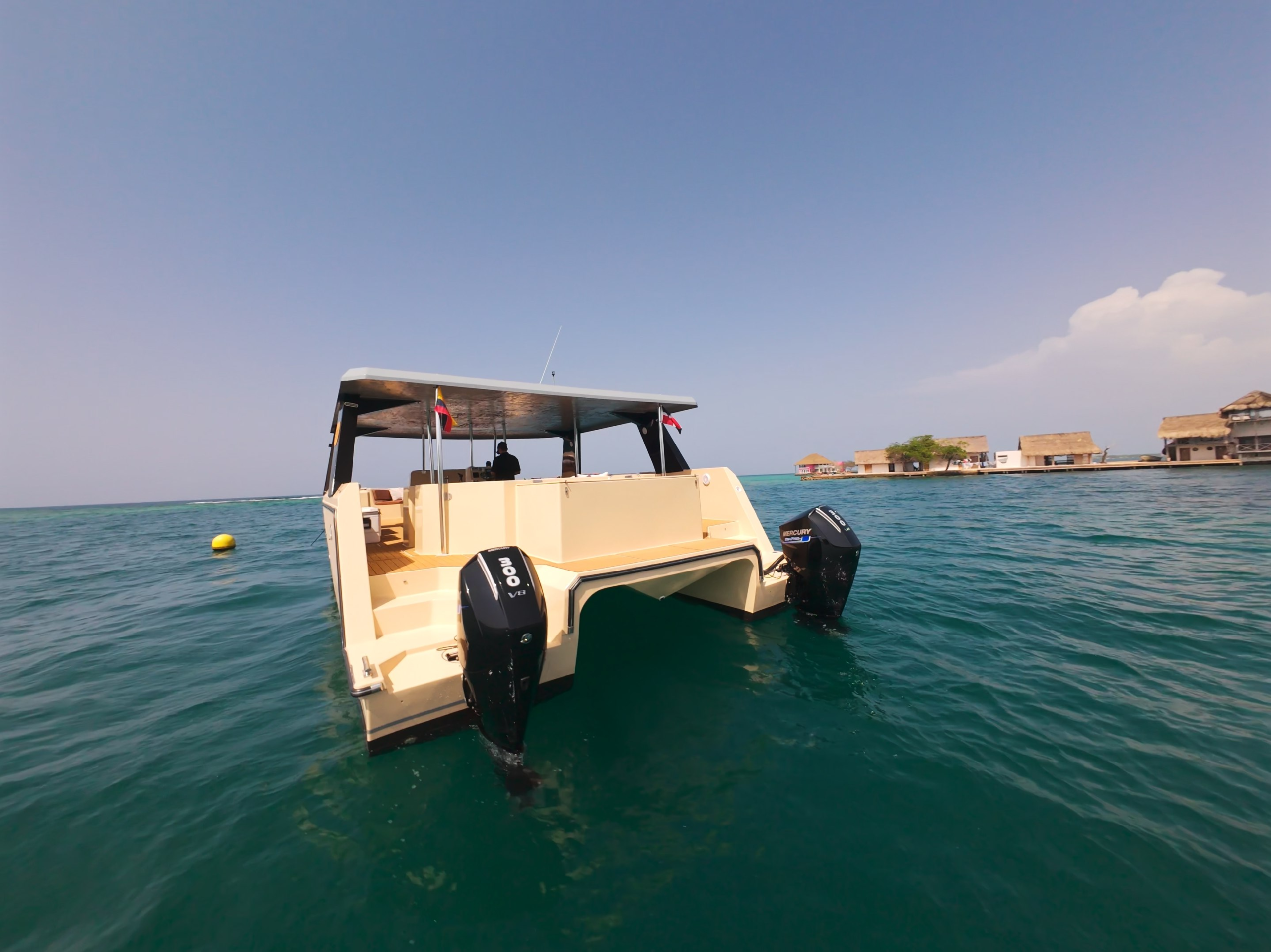 Twin-hull stern of the Alisio catamaran in the Rosario Islands