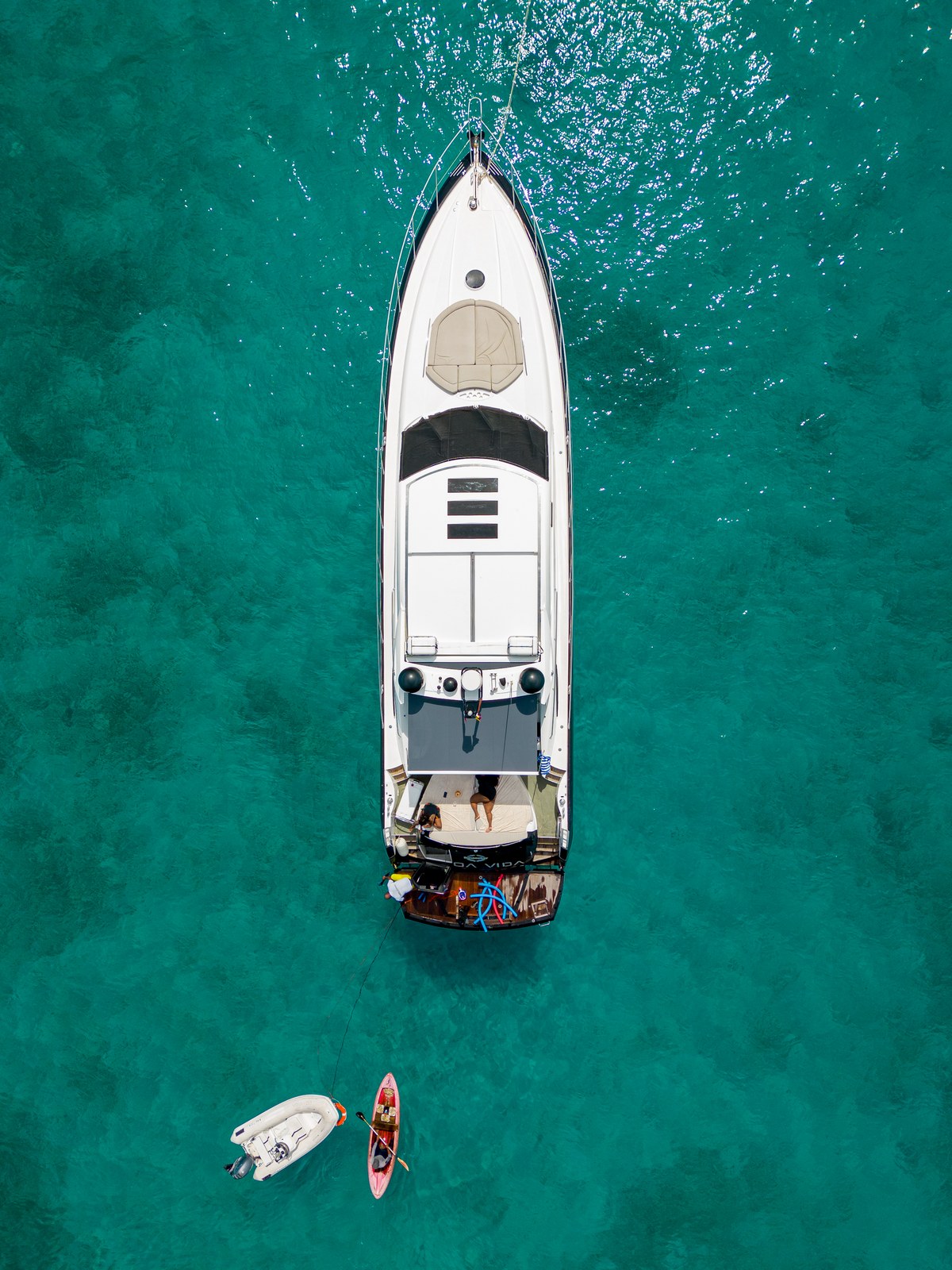 Sailing vessel anchored off a private beach club in the Rosario Islands archipelago