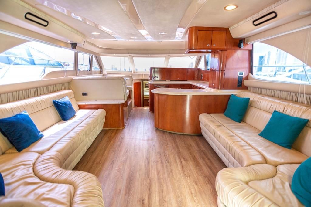 Main salon with sofas and galley on the Sea Ray 56 yacht
