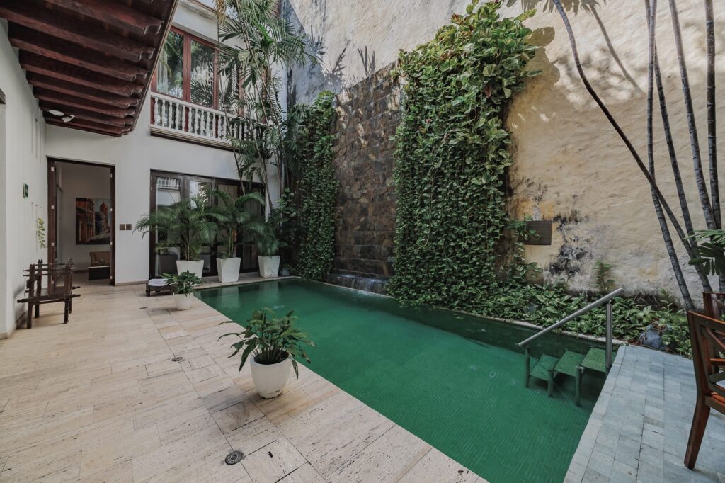 Walled City villa Cartagena — central patio with private pool